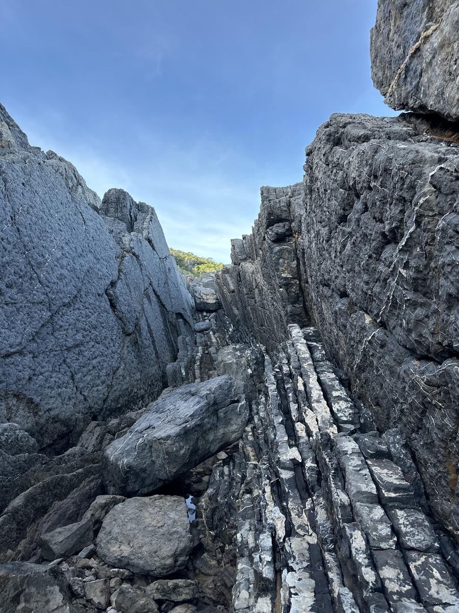 ISLAND CANYONS — geological hike on Ibiza (Moderate, 7 km). Striped basalt canyons carved into the eastern shore.
