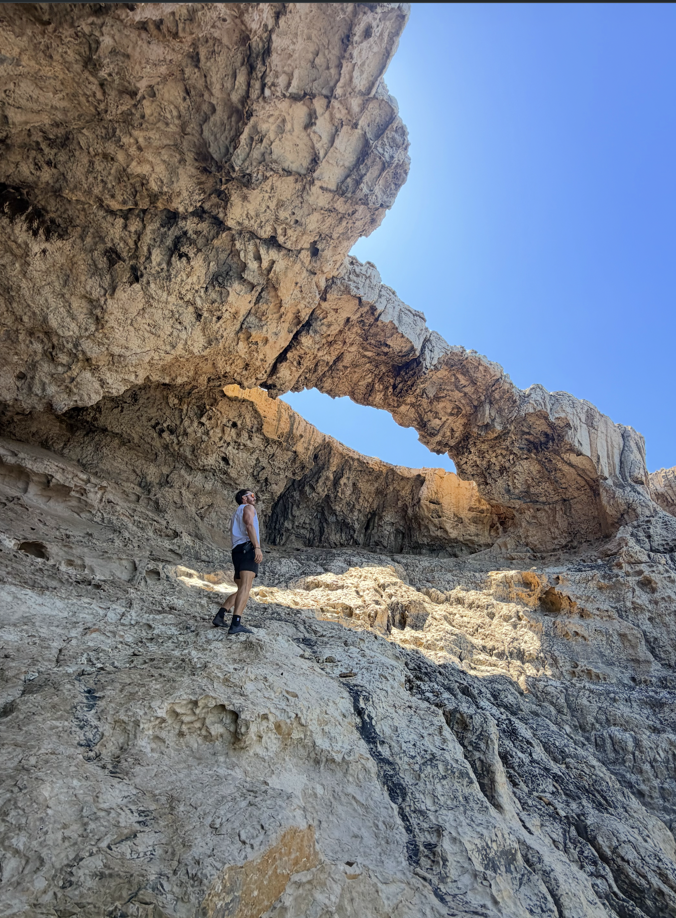 JURASSIC CAVE — selling fast hike on Ibiza (Moderate, 7 km). An ancient sea cave with a natural rock window.